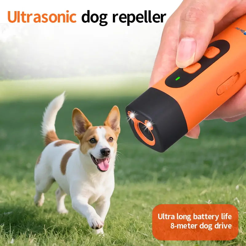 Handheld ultrasonic dog repeller in use with active dog deterrent beam