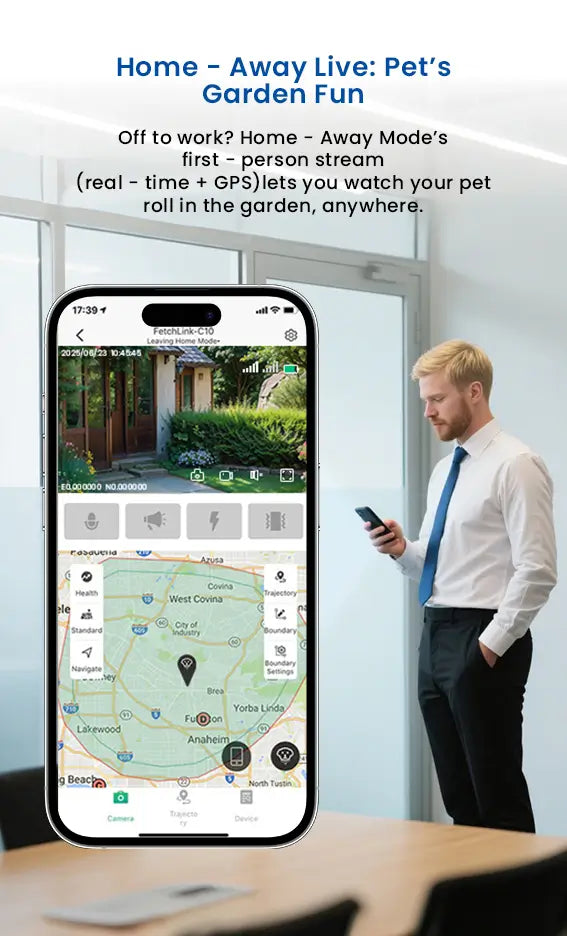 Man checking real-time GPS and live video of his pet from an office via the smart collar app.