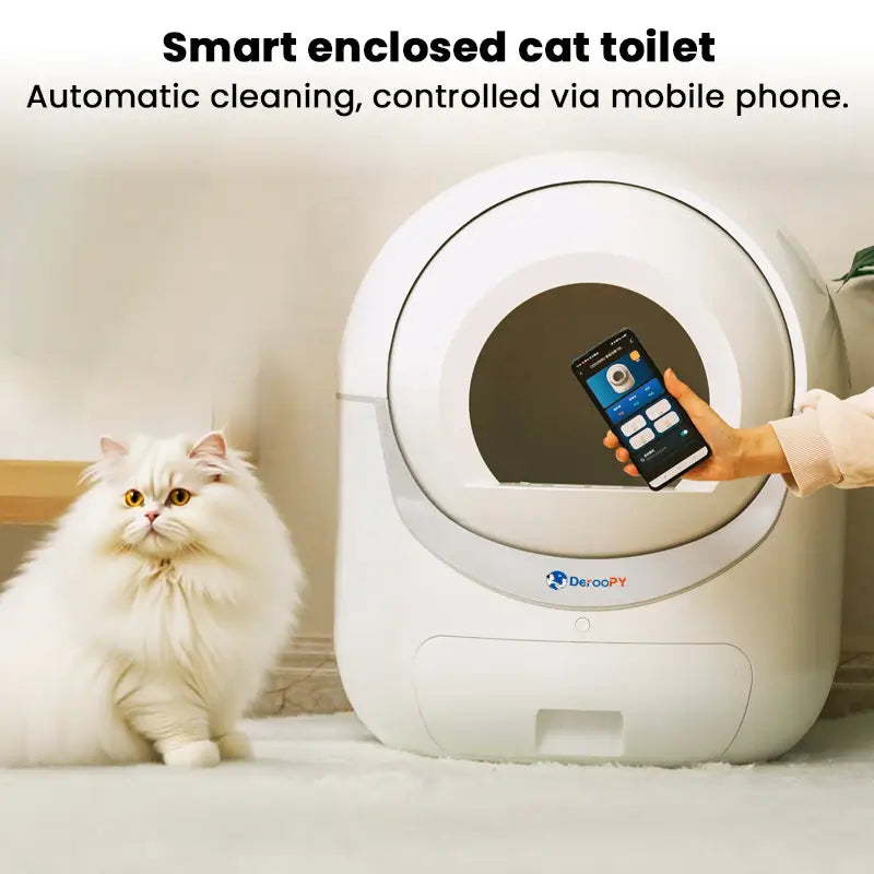 Smart enclosed automatic cat toilet controlled by phone with fluffy white cat beside